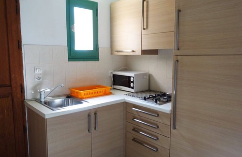 Aregno Apartment | Lovely apartment for 2 guests with WIFI, TV, terrace and parking