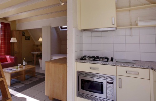 Municipality of Dalfsen House | Lovely apartment in villa for 4 guests with WIFI, pool, TV, terrace and parking