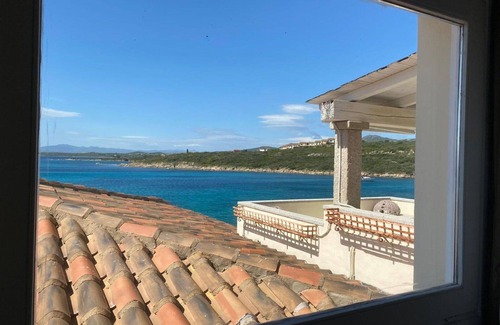 Baia Caddinas Apartment | Lovely apartment for 6 guests with A/C, pool, WIFI, TV, terrace, pets allowed and parking