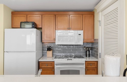 Baytowne Wharf Condo | Lovely Bay Views at Baytowne Wharf! Tropical Pool & Hot Tub, Beach Tram, Gym.