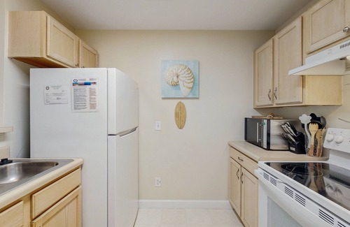 Folly Beach Condo | Lovely condo with marsh view, shaded balcony, central AC - 1 mile to Folly Beach
