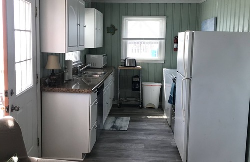 Long Beach Cottage | Lovely cottage, Ocean Front , small Dog friendly -150 one time fee oak island