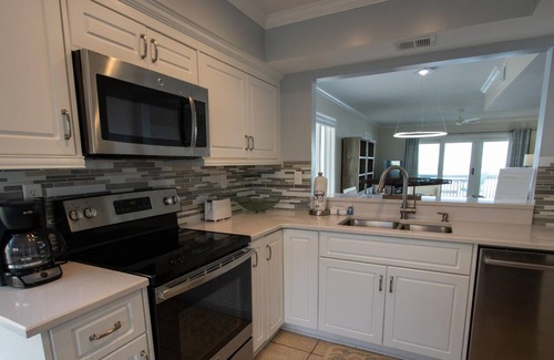 Saint Helena Island Condo | Lovely First Floor Condo with Deck, Ocean Views and Golf Cart Included