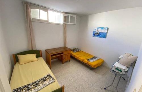 Hiboun Apartment | Lovely garden-level near Beach