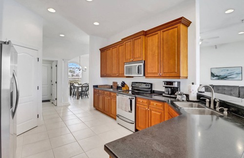 Cape Coral House | Lovely! Heated Pool & Canal Front! SE Cape Coral! Free Kayaks & Over $125 of Free Daily Activities!