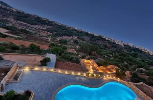 Xaghra Apartment | Lovely home with beautiful view with communal pool by 360 Estates