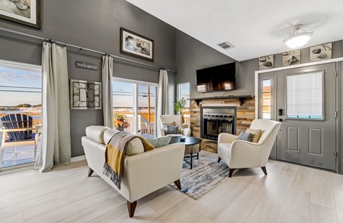Navarre Beach House | Lovely home with sound view, balcony, full kitchen, central AC, & washer/dryer
