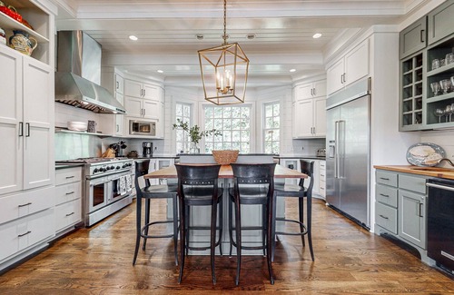 Lakemont House | Lovely lakefront estate with boathouse, pickleball, firepit, & stunning view