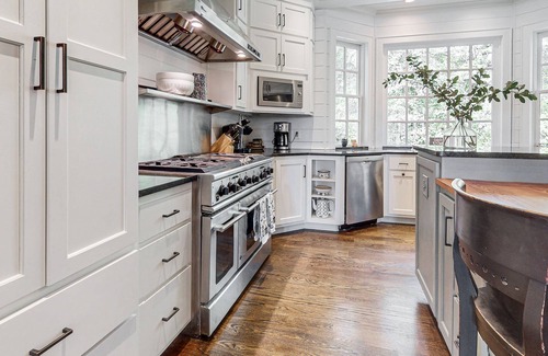 Lakemont House | Lovely lakefront estate with boathouse, pickleball, firepit, & stunning view