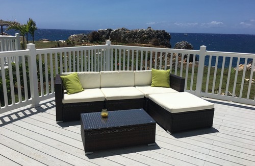 Orange Bay House | Lovely modern home overlooking the Caribbean Sea and only steps from the beach