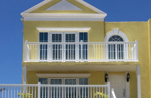 Orange Bay House | Lovely modern home overlooking the Caribbean Sea and only steps from the beach