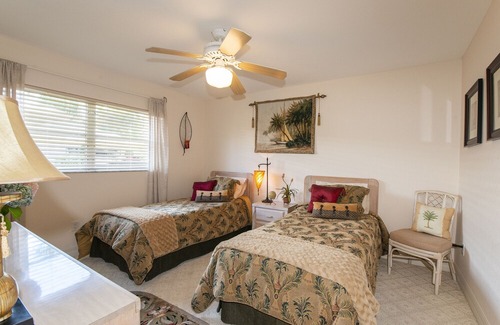 North Naples House | Lovely Naples home with pool and private boat dock, steps from Vanderbilt Beach