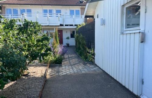 Bastad House | Lovely small room with a double bed no window in a charming Båstad villa prime location with terrace
