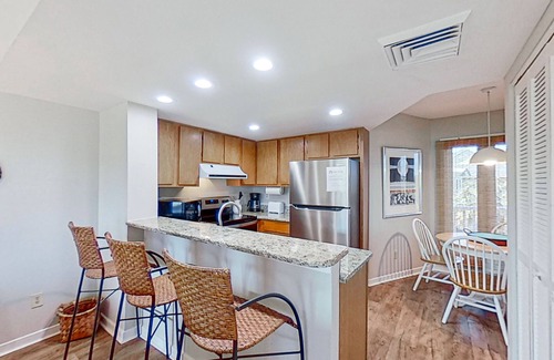 Isle of Palms Villa | Lovely top floor villa in Wild Dunes with partial ocean views, pool, & W/D