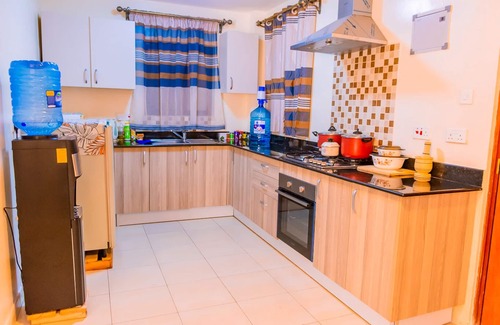 Nairobi West House | Lovely two bedroom space with rooftop outdoor pool and terrace with scenic views