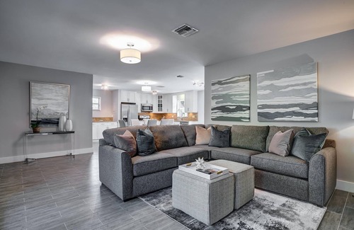 Coral Heights House | Lovely Vacation Home with a tropical private yard and heated pool near the Beach