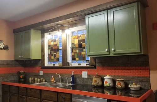 Springfield House | Lower duplex apartment, centrally located. Beautifully furnished, 1970s feel.