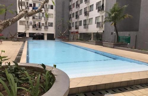 Cipaganti Apartment | Lower Floor and Simply Modern 2BR Apartment at The Jarrdin Cihampelas By Travelio