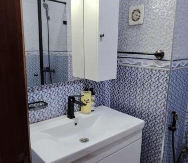 El Jadida Apartment | lumineux, or et ébène Mariés et familles