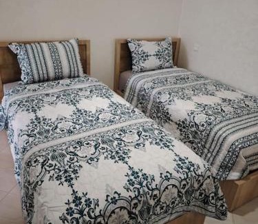 El Jadida Apartment | lumineux, or et ébène Mariés et familles