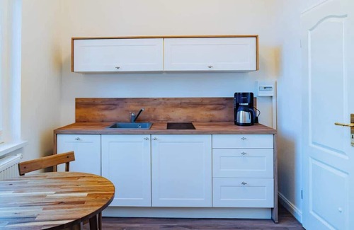 Warnemuende Apartment | Luminos Summary: Hist