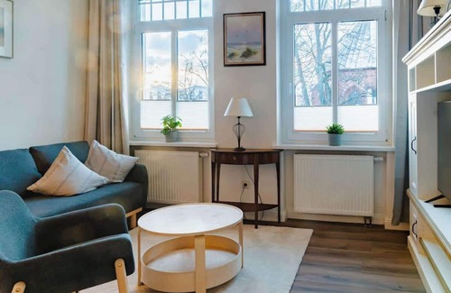 Warnemuende Apartment | Luminos Summary: Hist