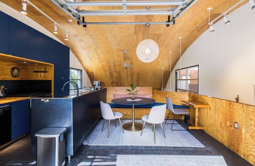 Santa Fe House | Luminous Quonset Luxury by Cafecito in Baca Railyard