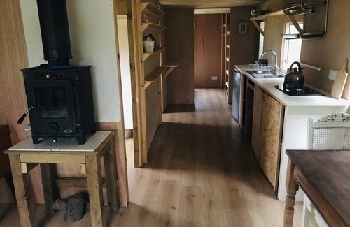 Guisborough House | Luna Lodge, nestled in field and woodland surroundings