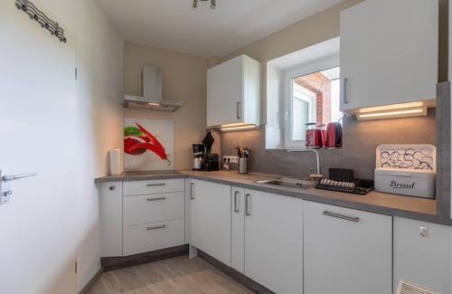 Osterhusum Apartment | Lütte Eck vacation apartment in Husum for up to 2 people