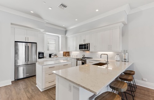 Clearwater Beach House | LUX 3 STORY/4 DECKS WATERFRONT W/3 BR w/DOCK & BOAT SLIP! Walk to beach! BBQ!
