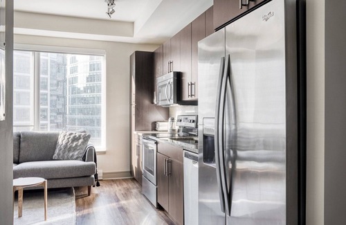 Seaport District Apartment | Lux Seaport 1BR w/Gym on Harbor by Blueground