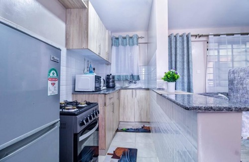Mbotela Apartment | Lux Suites Oak South Gardens Apartments