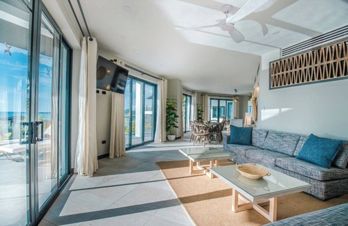 Fryes Beach Hotel | Luxe 2 Bedroom Retreat Overlooking Blue Waters with Direct Beach Access