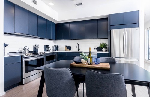 North Capitol Condo | Luxe 5th-floor downtown condo on the riverfront with river views, balcony & W/D