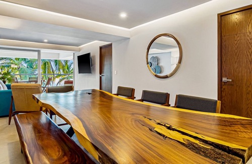 Las Glorias Apartment | Luxe beachfront condo with balcony, multiple pools, ocean views, & WiFi