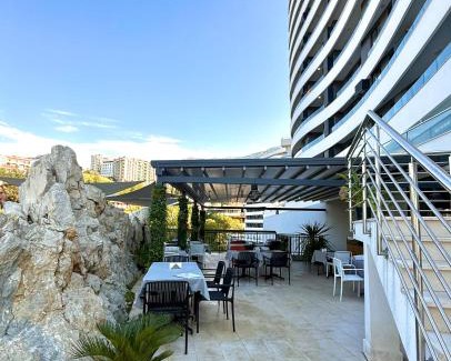 Becici Apartment | Luxe Beachfront Stay in Bečići with Pool