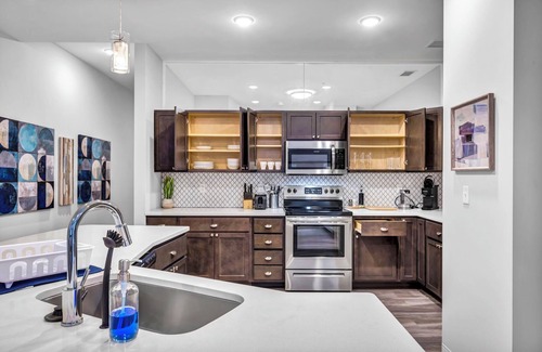 Gateway District Apartment | Luxe Flat w/Heated Pool & Sauna Gym Heart of DT