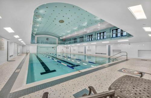 Gateway District Apartment | Luxe Flat with Heated Pool Sauna Rooftop Deck Gym