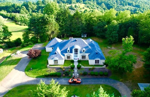 Andover House | Luxe Gated Mansion - Basketball Court Movie Theater Acreage