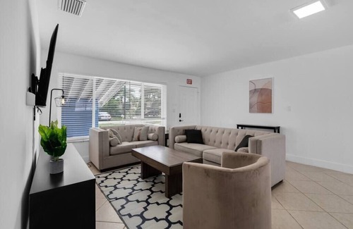 Driftwood House | Luxe Getaway: Poolside Paradise with Game Room