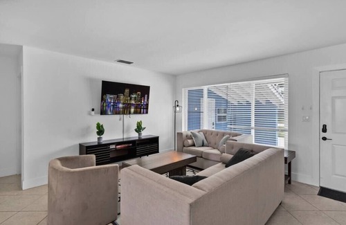 Driftwood House | Luxe Getaway: Poolside Paradise with Game Room