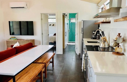 Dripping Springs Apartment | Luxe Modern Treehouse w Heated Pool & Firepit