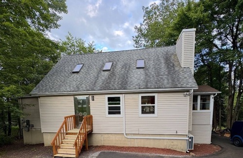 Long Pond House | Luxe Pocono Oasis! Hot Tub, Firepit, Sauna, Lake, Ski, BBQ, Game Room, Fireplace