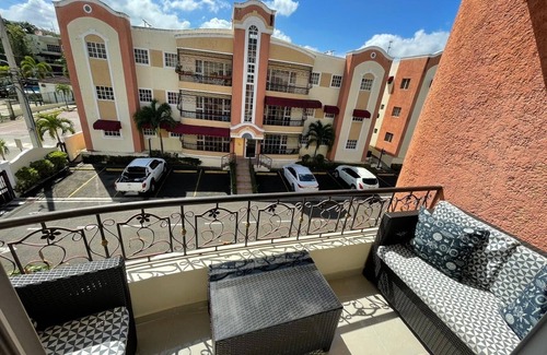 Gregorio Luperon Apartment | Luxury condo with pool gym parking wifi and more
