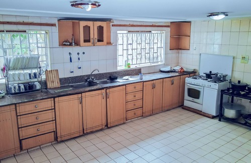 Nairobi House | Luxurious 9-bedroom mansion in Nairobi’s serene Thome 5, near malls and dining.
