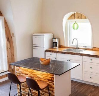 Springvale House | Luxurious and Carbon Neutral Hobbit House with Private Hot Tub in Springvale, Maine, Perfect for a Relaxing Weekend Getaway