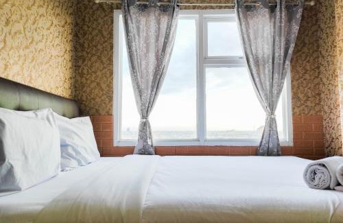 Panakkukang Apartment | Luxurious and Comfy 2BR at Vida View Makassar Apartment By Travelio