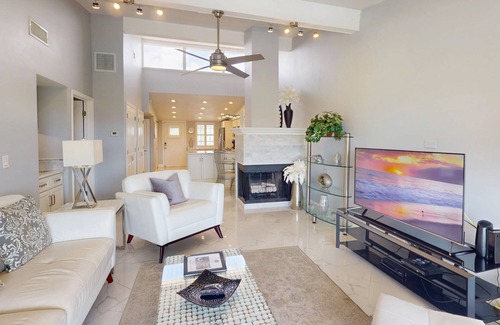 Capri Isle Condo | Luxurious Coastal Condo with Waterway Views, Pool, Balcony, and Steps to Treasure Island Beach.