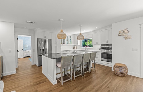 Singer Island House | Luxurious Haven: 4-Bedroom, 3-Bathroom Pool house