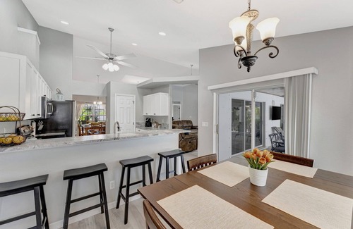 Pelican House | Luxurious Heated Saltwater Pool Home